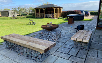 Chris' gabion Seating and Firepit, using sleepers for tops.